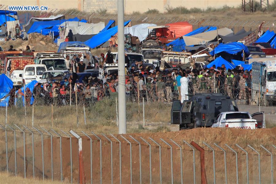 JORDAN-MAFRAQ-HUMANITARIAN AID-SYRIA-BORDER-REFUGEES