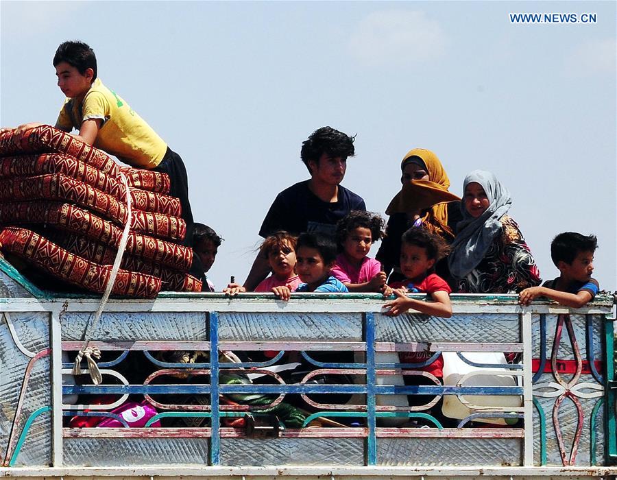 SYRIA-DARAA-CIVILIANS-RETURN-HOME