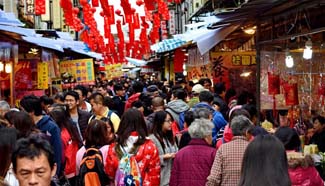 Customers shop for Spring Festive goods at market in Taipei