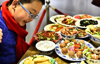 Spring Festival dishes made of polymer clay on exhibition in east China's Anhui