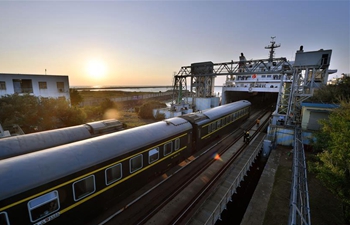 In pics: cross-sea rail line in China's Hainan during Spring Festival travel rush