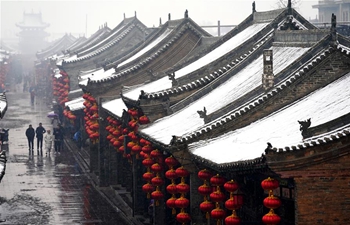 Snow scenery of Pingyao Ancient City in N China's Shanxi